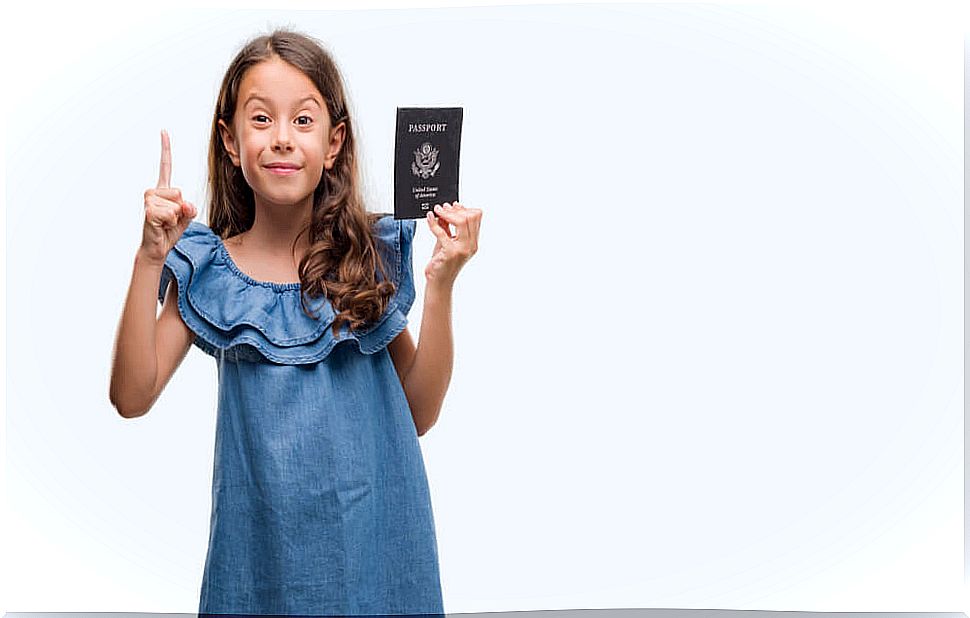 Girl with her passport in hand.
