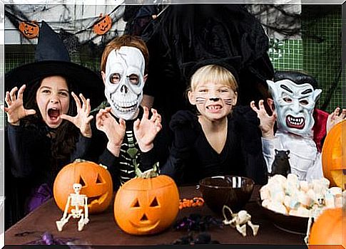 Kids with Halloween pumpkins