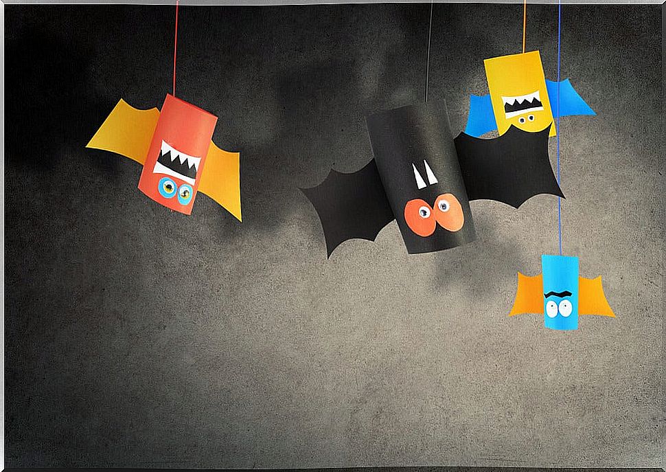 Bats made with toilet paper rolls as a Halloween craft.